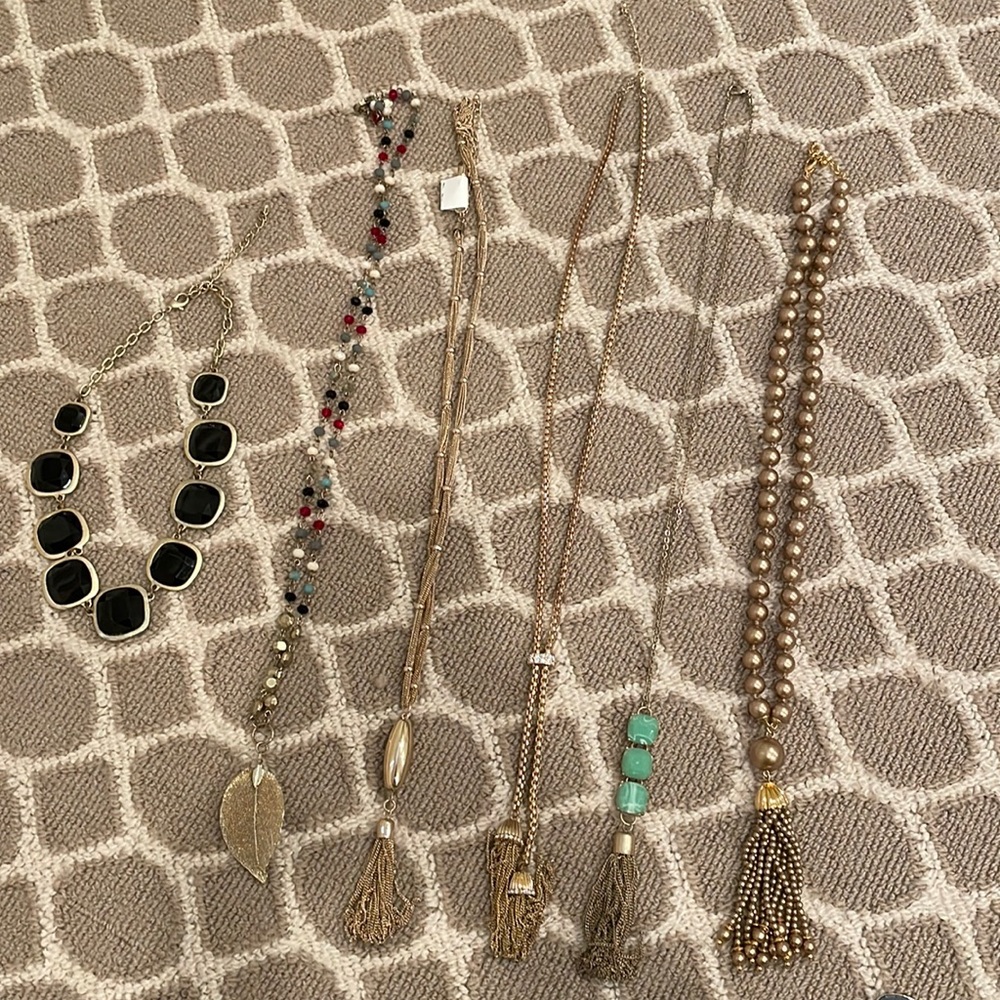 Six gold long necklaces